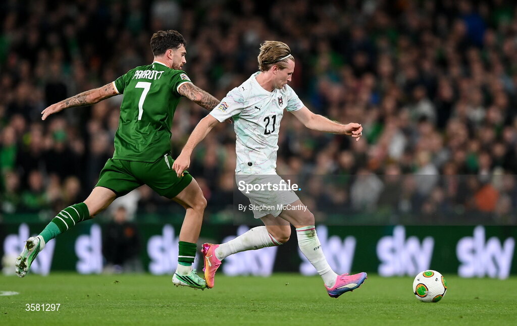 1 October 2026; Patrick Wimmer of Austria is tackled by Troy Parrott of Republic of Ireland during the UEFA Nations League B match between the Republic of Ireland and Austria at the Aviva Stadium in Dublin. Photo by Stephen McCarthy/Sportsfile