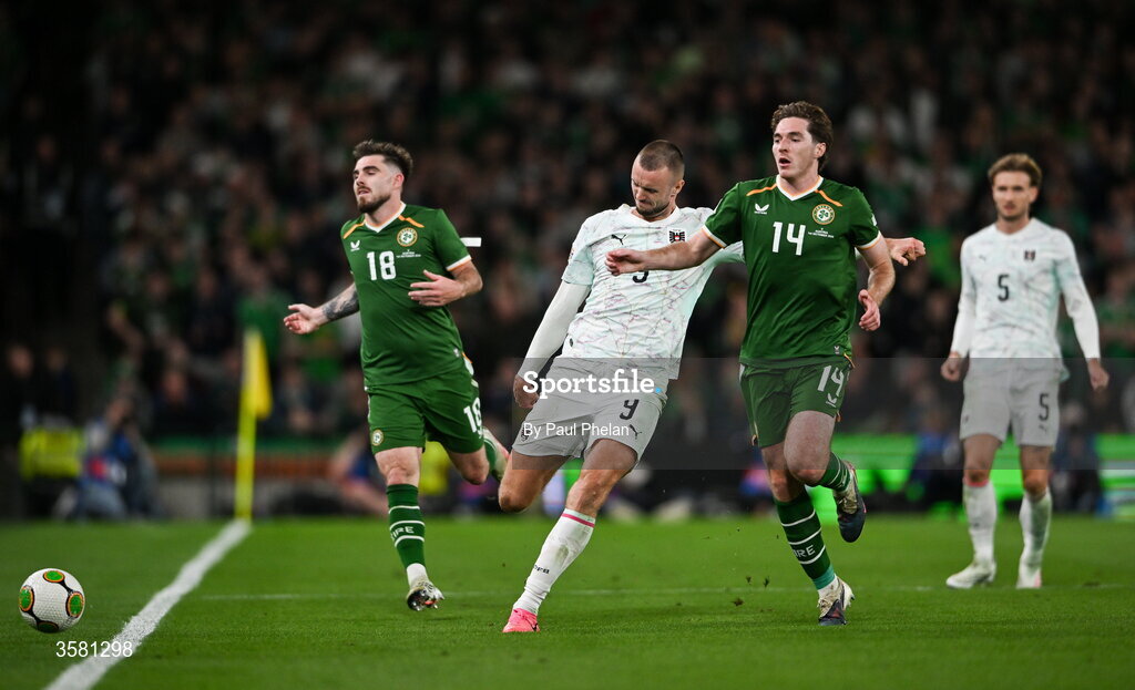 1 October 2026; Sasa Kalajdzic of Austria reacts after being tackled by Conor Coventry of Republic of Ireland during the UEFA Nations League B match between the Republic of Ireland and Austria at the Aviva Stadium in Dublin. Photo by Paul Phelan/Sportsfile
