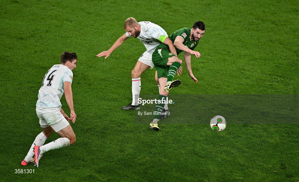 1 October 2026; Finn Azaz of Republic of Ireland in action against Konrad Laimer of Austria as Maximilian Wöber of Austria , 14, watches on during the UEFA Nations League B match between the Republic of Ireland and Austria at the Aviva Stadium in Dublin. Photo by Sam Barnes/Sportsfile