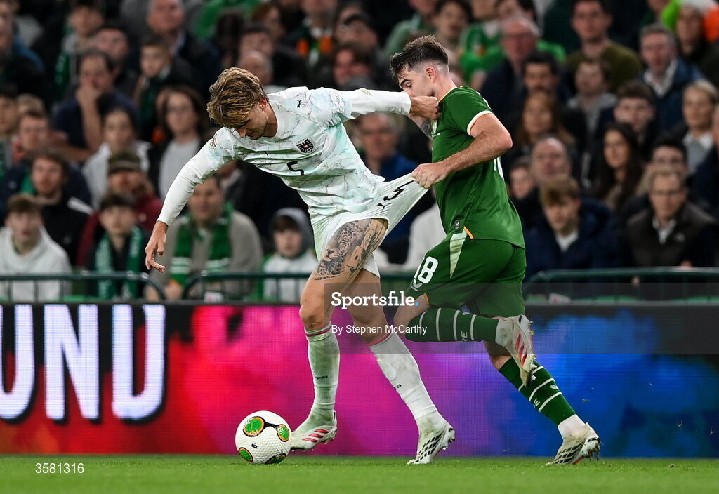 1 October 2026; Stefan Posch of Austria is tackled by Ryan Manning of Republic of Ireland during the UEFA Nations League B match between the Republic of Ireland and Austria at the Aviva Stadium in Dublin. Photo by Stephen McCarthy/Sportsfile