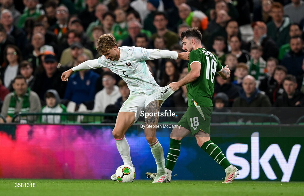1 October 2026; Stefan Posch of Austria is tackled by Ryan Manning of Republic of Ireland during the UEFA Nations League B match between the Republic of Ireland and Austria at the Aviva Stadium in Dublin. Photo by Stephen McCarthy/Sportsfile
