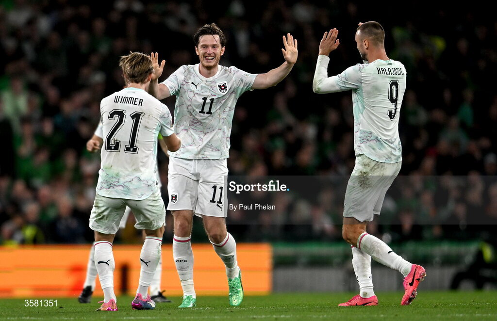 1 October 2026; Michael Gregoritsch of Austria, centre, celebrates with team-mates Patrick Wimmer, left, and Sasa Kalajdzic after scoring their side's second goal during the UEFA Nations League B match between the Republic of Ireland and Austria at the Aviva Stadium in Dublin. Photo by Paul Phelan/Sportsfile