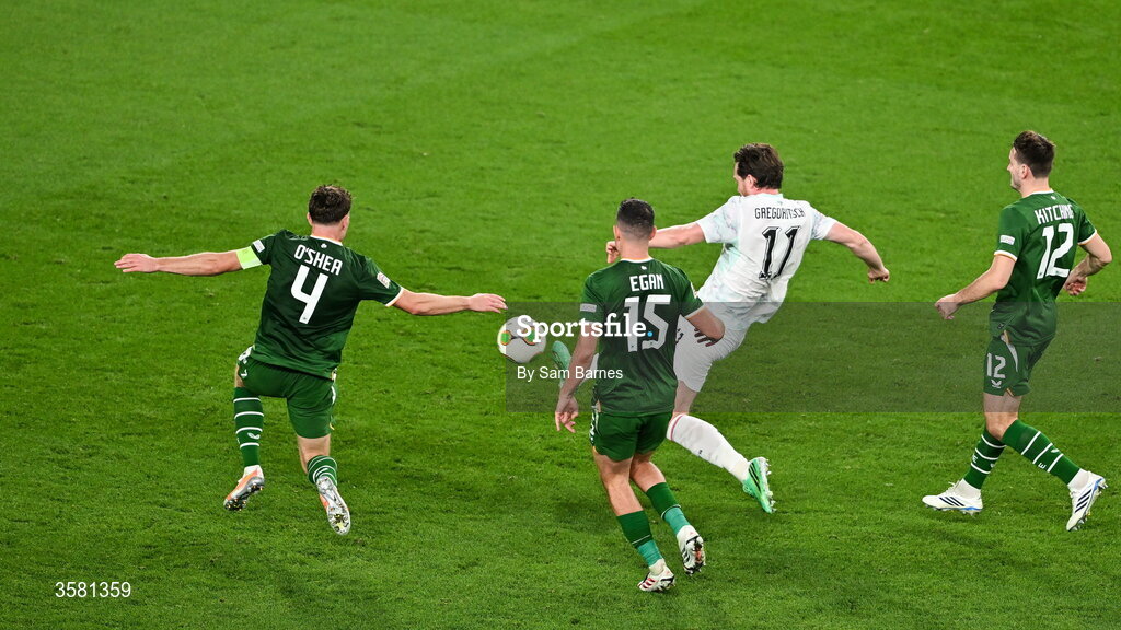 1 October 2026; Michael Gregoritsch of Austria has a shot on goal while under pressure from Republic of Ireland players, from left, Dara O'Shea, John Egan and Liam Kitching during the UEFA Nations League B match between the Republic of Ireland and Austria at the Aviva Stadium in Dublin. Photo by Sam Barnes/Sportsfile