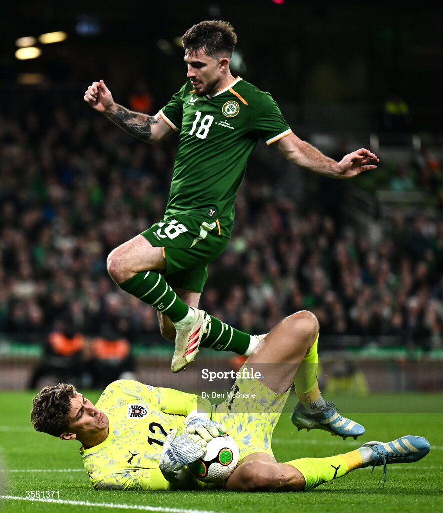 1 October 2026; Austria goalkeeper Florian Wiegele makes a save from Ryan Manning of Republic of Ireland during the UEFA Nations League B match between the Republic of Ireland and Austria at the Aviva Stadium in Dublin. Photo by Ben McShane/Sportsfile
