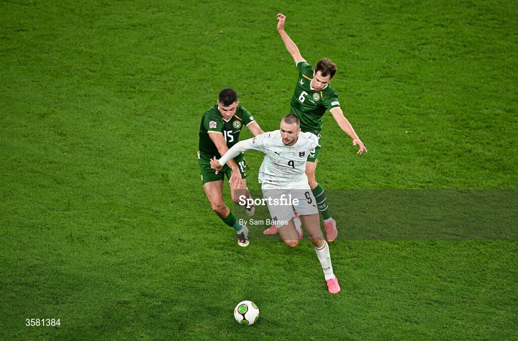 1 October 2026; Sasa Kalajdzic of Austria in action against John Egan, left, and Jayson Molumby of Republic of Ireland during the UEFA Nations League B match between the Republic of Ireland and Austria at the Aviva Stadium in Dublin. Photo by Sam Barnes/Sportsfile