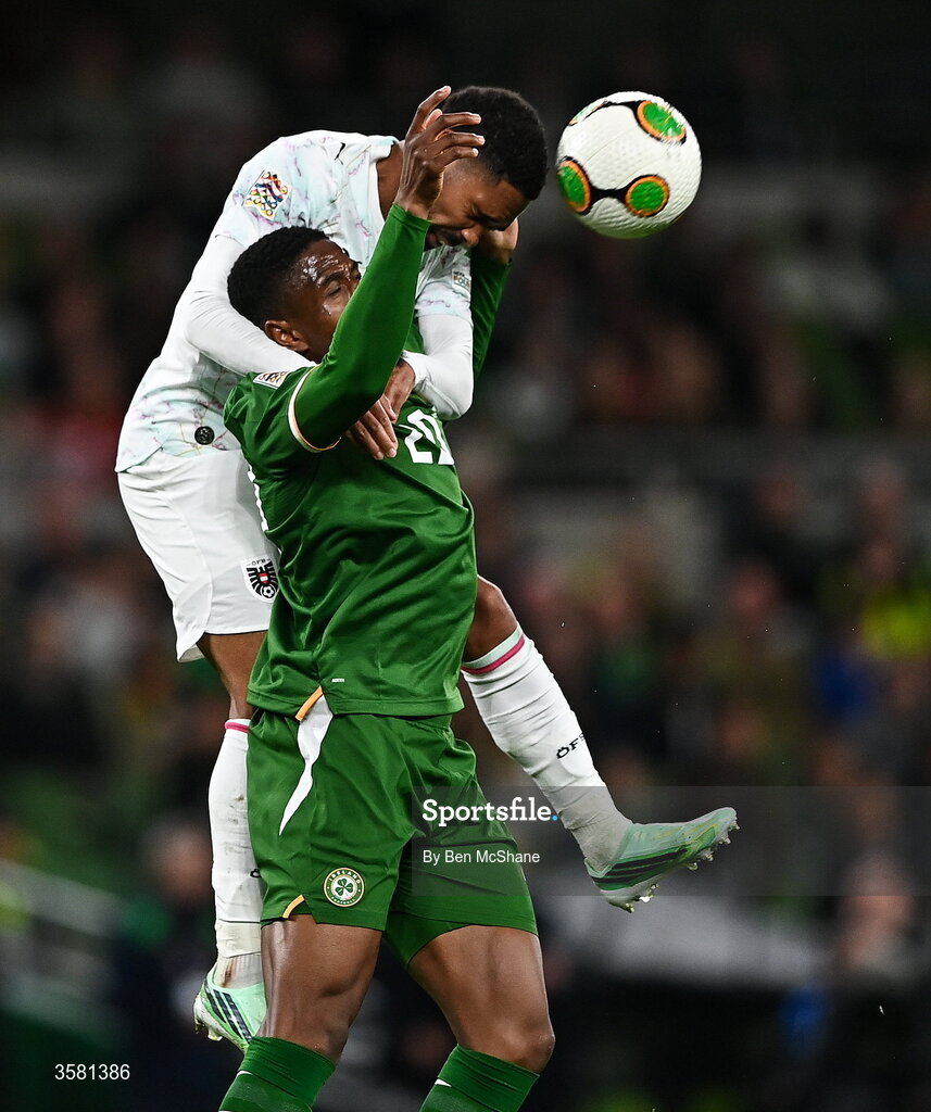 1 October 2026; Chiedozie Ogbene of Republic of Ireland is tackled by Phillipp Mwene of Austria during the UEFA Nations League B match between the Republic of Ireland and Austria at the Aviva Stadium in Dublin. Photo by Ben McShane/Sportsfile