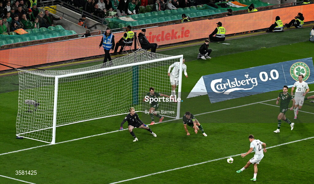 1 October 2026; Alexander Prass of Austria, 22, shoots to score his side's first goal despite the efforts of Republic of Ireland players, from left, goalkeeper Caoimhín Kelleher, Jayson Molumby and Dara O'Shea during the UEFA Nations League B match between the Republic of Ireland and Austria at the Aviva Stadium in Dublin. Photo by Sam Barnes/Sportsfile