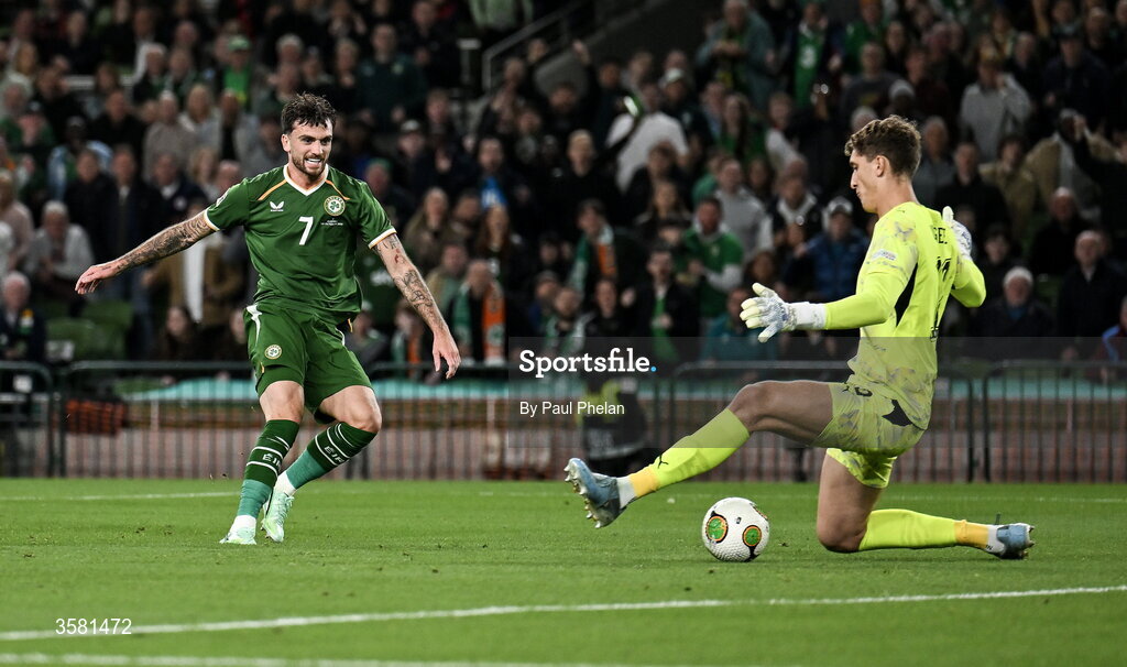 1 October 2026; Troy Parrott of Republic of Ireland shoots to score his side's first goal past Austria goalkeeper Florian Wiegele during the UEFA Nations League B match between the Republic of Ireland and Austria at the Aviva Stadium in Dublin. Photo by Paul Phelan/Sportsfile