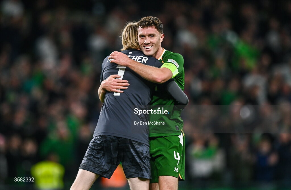 1 October 2026; Dara O'Shea of Republic of Ireland and Republic of Ireland goalkeeper Caoimhín Kelleher embrace after their side's first goal before the UEFA Nations League B match between the Republic of Ireland and Austria at the Aviva Stadium in Dublin. Photo by Ben McShane/Sportsfile
