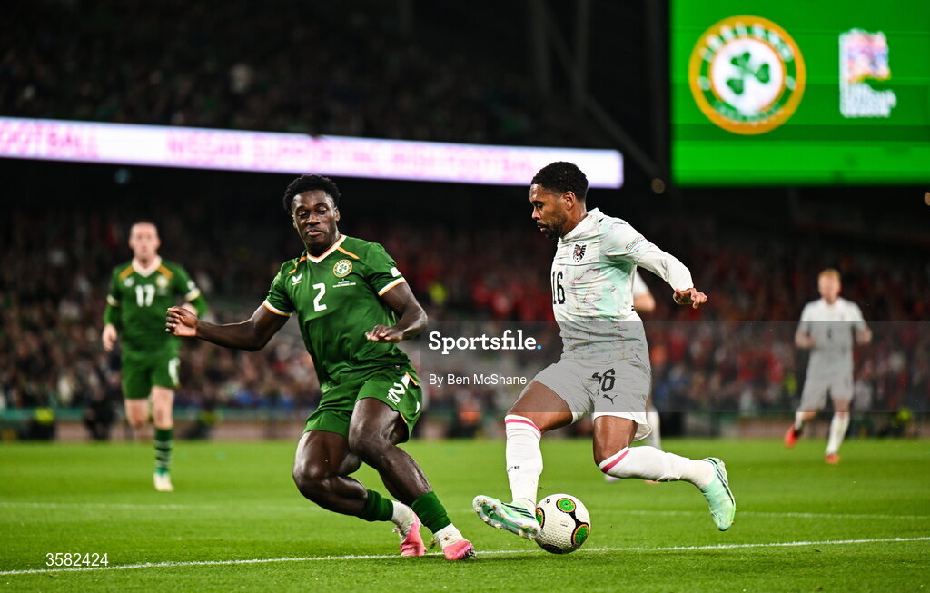 1 October 2026; Phillipp Mwene of Austria and James Abankwah of Republic of Ireland during the UEFA Nations League B match between the Republic of Ireland and Austria at the Aviva Stadium in Dublin. Photo by Ben McShane/Sportsfile