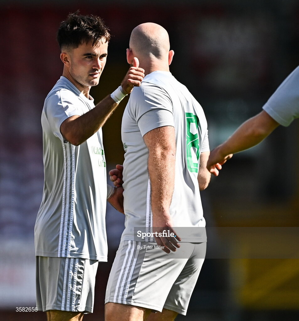 3 October 2026; Luke Casey of Coachford, left, celebrates after scoring his side's first goal during the FAI Junior Cup final between Coachford and Evergreen at Munster FA Turner's Cross Park in Cork. Photo by Tyler Miller/Sportsfile