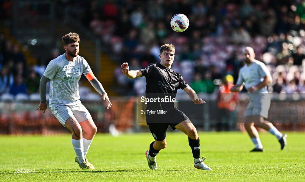 3 October 2026; Diarmuid Behan of Evergreen in action against Mark Murphy of Coachford during the FAI Junior Cup final between Coachford and Evergreen at Munster FA Turner's Cross Park in Cork. Photo by Tyler Miller/Sportsfile