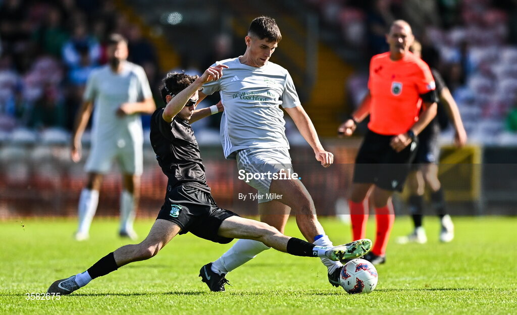 3 October 2026; Sam Hickey of Evergreen in action against Adam Murphy of Coachford during the FAI Junior Cup final between Coachford and Evergreen at Munster FA Turner's Cross Park in Cork. Photo by Tyler Miller/Sportsfile