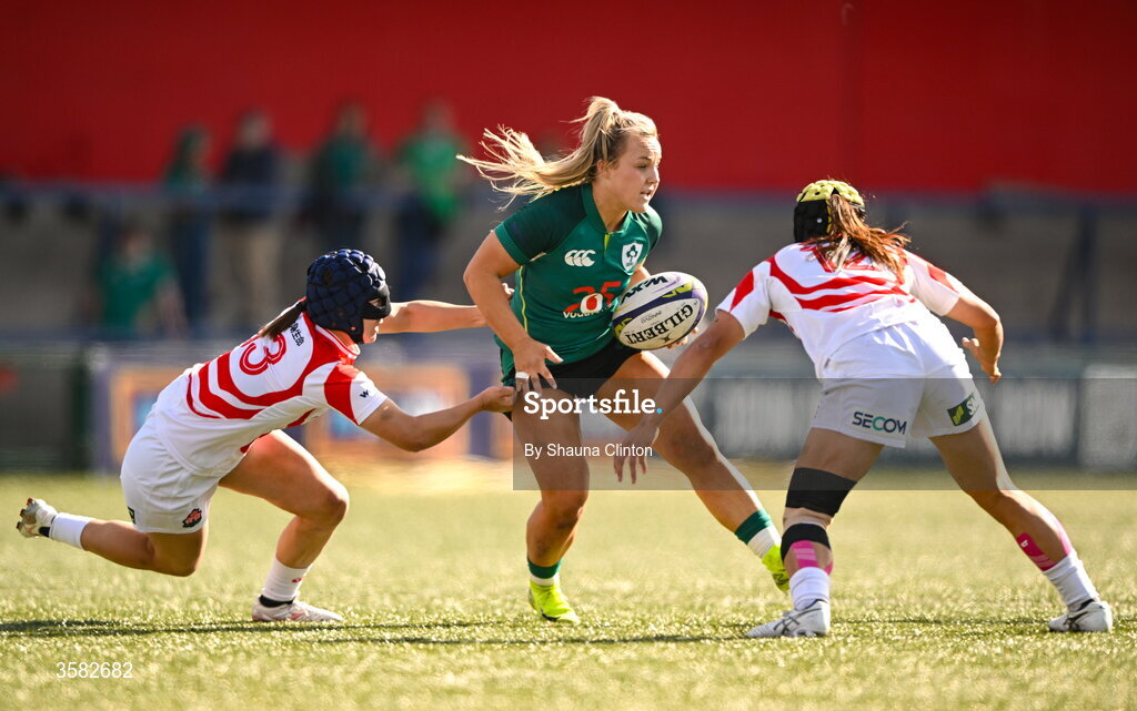 3 October 2026; Aoife Dalton of Ireland in action against Uta Kataoka, left, and Mana Furata of Japan during the International Women's Rugby fixture between Ireland and Japan at Virgin Media Park in Cork. Photo by Shauna Clinton/Sportsfile