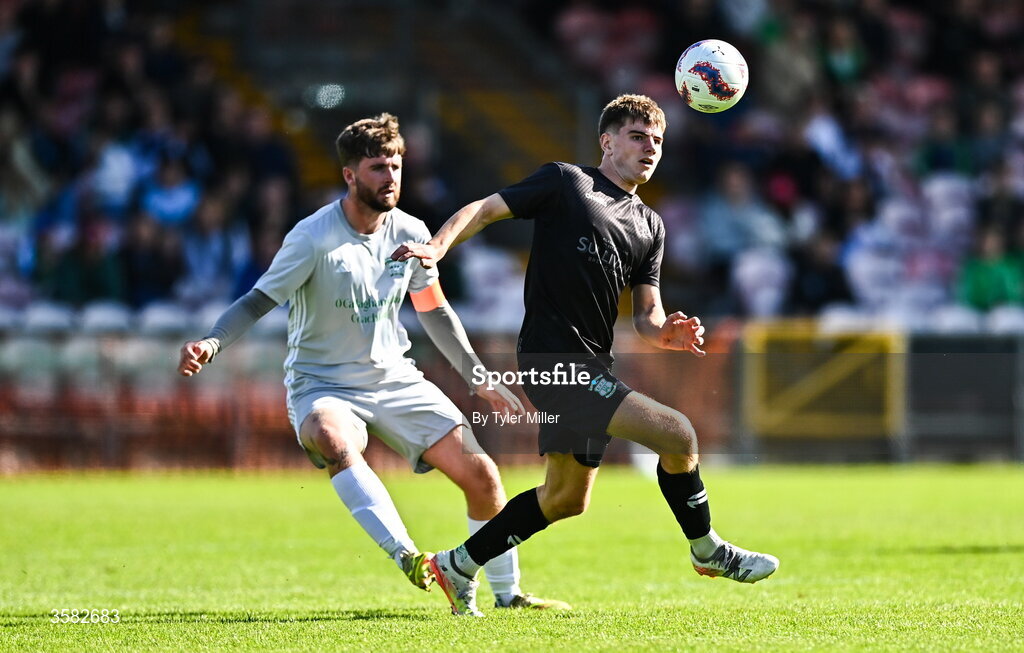3 October 2026; Diarmuid Behan of Evergreen in action against Mark Murphy of Coachford during the FAI Junior Cup final between Coachford and Evergreen at Munster FA Turner's Cross Park in Cork. Photo by Tyler Miller/Sportsfile