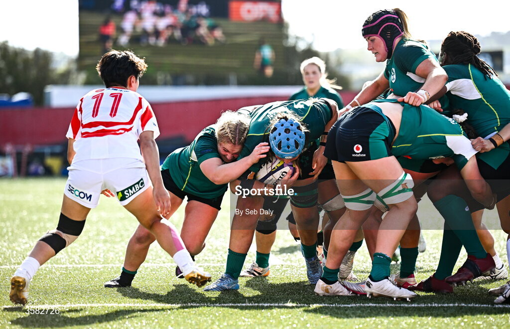 3 October 2026; Brittany Hogan of Ireland, blue cap, on her way to scoring her side's second try during the International Women's Rugby fixture between Ireland and Japan at Virgin Media Park in Cork. Photo by Seb Daly/Sportsfile