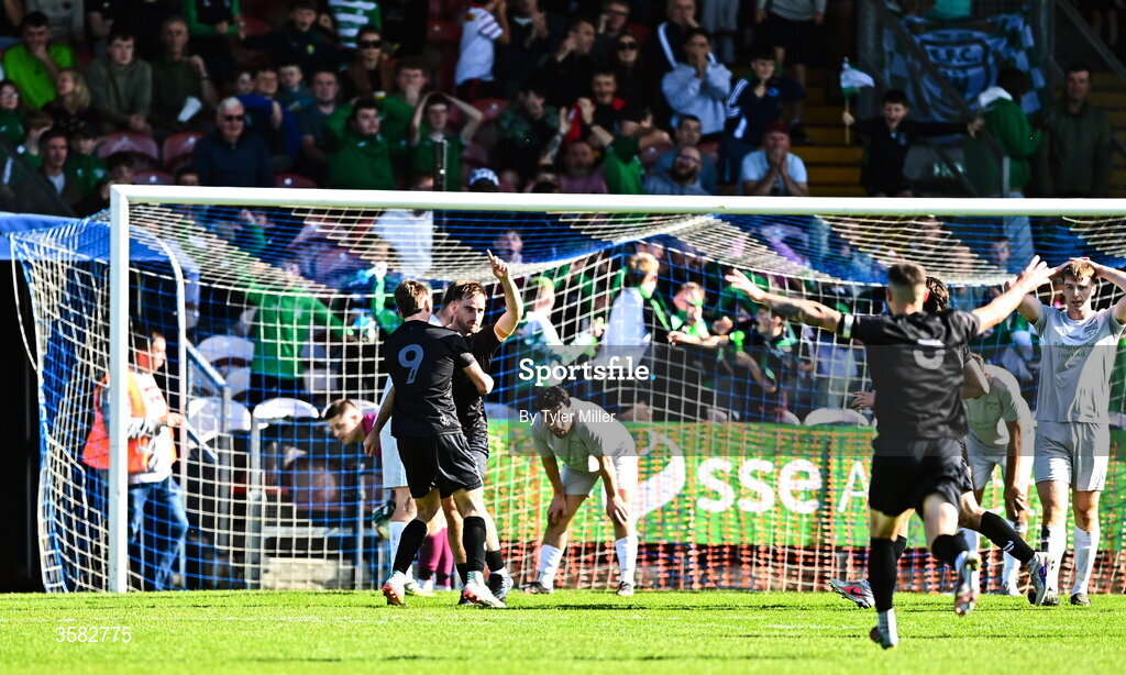 3 October 2026; Ethan Phelan of Evergreen, right, celebrates with teammate Diarmuid Behan after scoring their side's first goal during the FAI Junior Cup final between Coachford and Evergreen at Munster FA Turner's Cross Park in Cork. Photo by Tyler Miller/Sportsfile