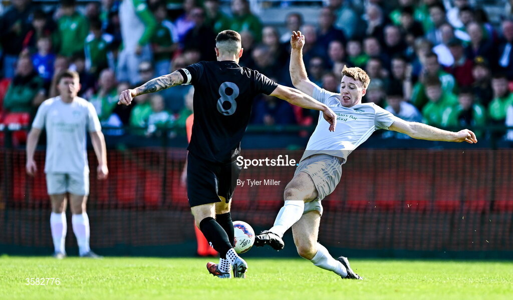 3 October 2026; Mark O'Connell of Coachford in action against Michael Drennan of Evergreen during the FAI Junior Cup final between Coachford and Evergreen at Munster FA Turner's Cross Park in Cork. Photo by Tyler Miller/Sportsfile