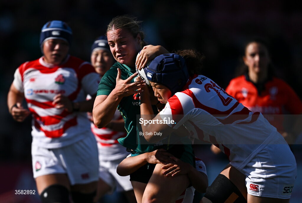 3 October 2026; Alana McInerney of Ireland is tackled by Mio Nishimura of Japan on her way to scoring her side's fifth try during the International Women's Rugby fixture between Ireland and Japan at Virgin Media Park in Cork. Photo by Seb Daly/Sportsfile