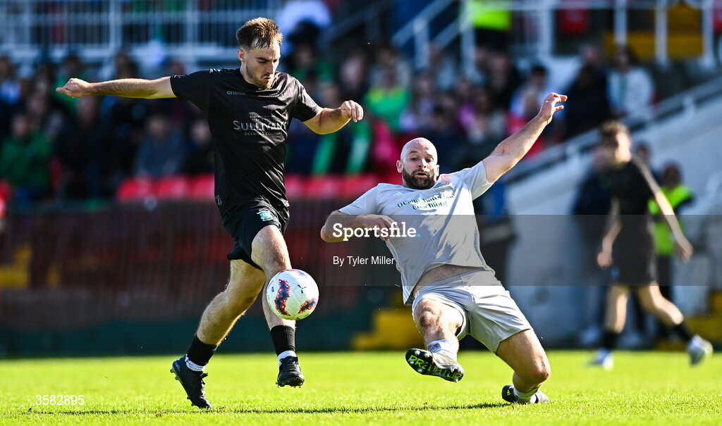 3 October 2026; Sean O'Sullivan of Coachford in action against Ethan Phelan of Evergreen during the FAI Junior Cup final between Coachford and Evergreen at Munster FA Turner's Cross Park in Cork. Photo by Tyler Miller/Sportsfile