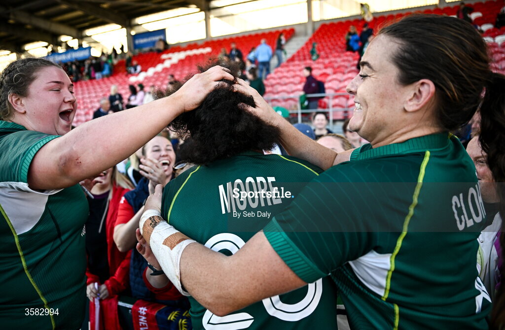 3 October 2026; Grace Moore of Ireland, centre, is congratulated by teammates Eilís Cahill, left, and Jane Clohessy after the International Women's Rugby fixture between Ireland and Japan at Virgin Media Park in Cork. Photo by Seb Daly/Sportsfile