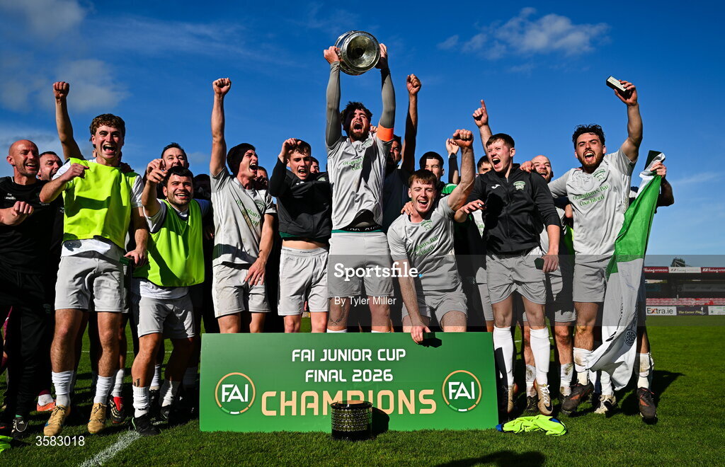3 October 2026; Coachford captain Mark Murphy lifts the trophy alongside teammates after the FAI Junior Cup final between Coachford and Evergreen at Munster FA Turner's Cross Park in Cork. Photo by Tyler Miller/Sportsfile