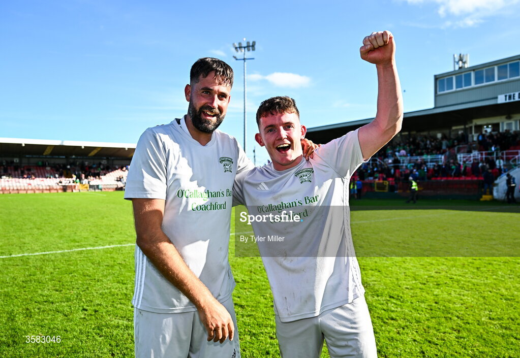 3 October 2026; Keith Linzell, left, and Matthew Bradley of Coachford celebrate after the FAI Junior Cup final between Coachford and Evergreen at Munster FA Turner's Cross Park in Cork. Photo by Tyler Miller/Sportsfile