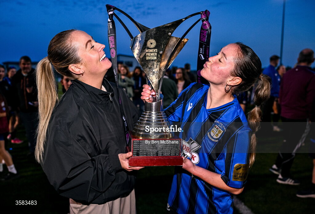 3 October 2026; Athlone head coach Lily Agg, left, and Athlone Town captain Hannah Waesch celebrate with the SSE Airtricity Women's Premier Division trophy after the SSE Airtricity Women's Premier Division match between Athlone Town and Galway United at Athlone Town Stadium in Lissywollen, Athlone, Westmeath. Photo by Ben McShane/Sportsfile
