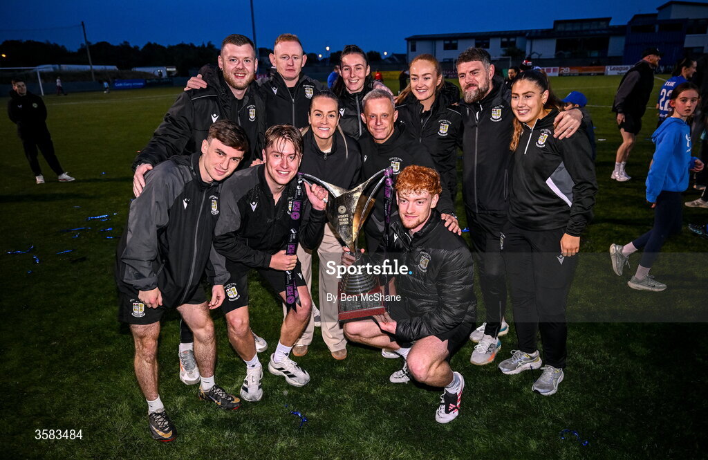 3 October 2026; Athlone head coach Lily Agg, centre-left, celebrates alonside her staff and the SSE Airtricity Women's Premier Division trophy after the SSE Airtricity Women's Premier Division match between Athlone Town and Galway United at Athlone Town Stadium in Lissywollen, Athlone, Westmeath. Photo by Ben McShane/Sportsfile