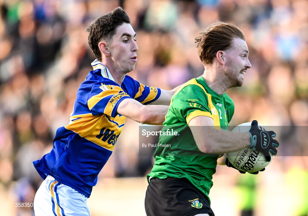 3 October 2026; Seán Kennedy of Thomas Davis in action against Ger McDermottroe of Castleknock during the Dublin County Senior Club Football Championship semi-final match between Thomas Davis and Castleknock at Parnell Park in Dublin. Photo by Paul Phelan/Sportsfile