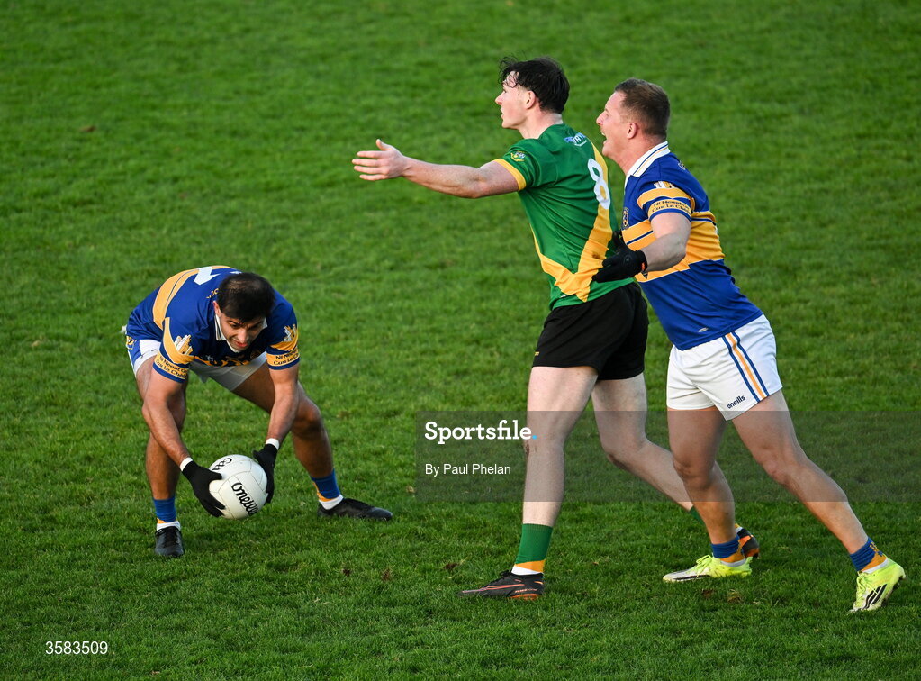 3 October 2026; Shairoze Akram of Castleknock gains possesion while his teammate Ciarán Kilkenny and Adam Waddick of Thomas Davis protest a decision during the Dublin County Senior Club Football Championship semi-final match between Thomas Davis and Castleknock at Parnell Park in Dublin. Photo by Paul Phelan/Sportsfile