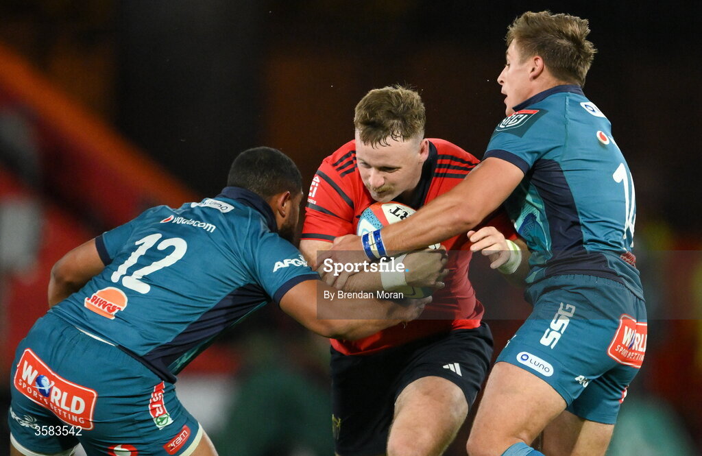3 October 2026; Seán O'Brien of Munster is tackled by Stravino Jacobs and Sebastian de Klerk of Vodacome Bulls during the United Rugby Championship match between Munster and Vodacom Bulls at Thomond Park in Limerick. Photo by Brendan Moran/Sportsfile