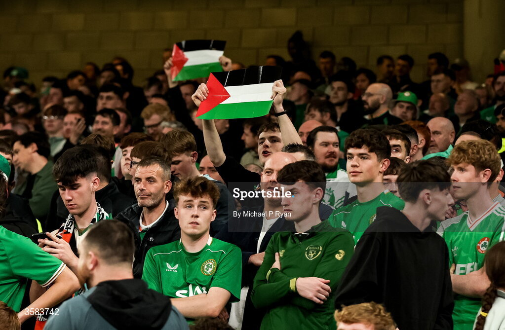 1 October 2026; Republic of Ireland supporters hold up a Palestine flag during the UEFA Nations League B match between the Republic of Ireland and Austria at the Aviva Stadium in Dublin. Photo by Michael P Ryan/Sportsfile