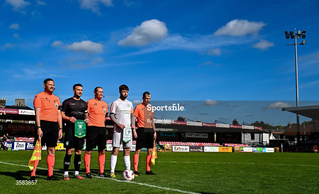 3 October 2026; Referee Brian Higgins and his officials with team captains Michael Drennan of Evergreen and Mark Murphy of Coachford before the FAI Junior Cup final between Coachford and Evergreen at Munster FA Turner's Cross Park in Cork. Photo by Tyler Miller/Sportsfile