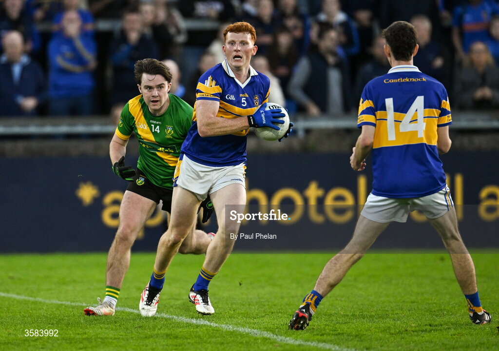 3 October 2026; Rob Shaw of Castleknock in action against Fionn Murray of Thomas Davis during the Dublin County Senior Club Football Championship semi-final match between Thomas Davis and Castleknock at Parnell Park in Dublin. Photo by Paul Phelan/Sportsfile