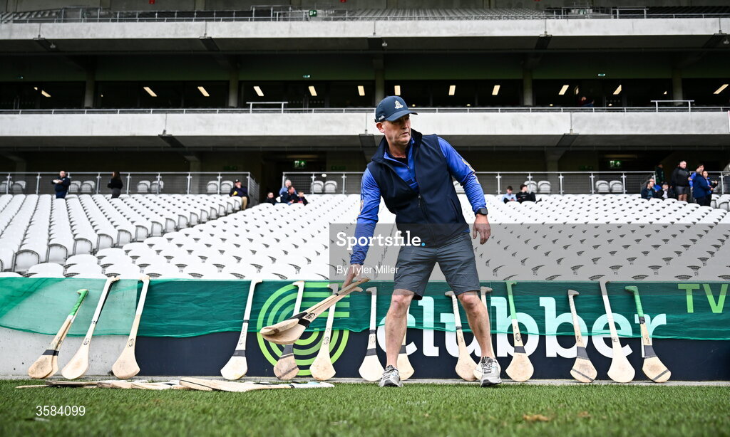 4 October 2026; St Finbarrs logistics staff Damien Murray lays hurleys on the side of the pitch before the Cork County Senior Club Hurling Championship semi-final match between Kanturk and St Finbarrs at SuperValu Páirc Uí Chaoimh in Cork. Photo by Tyler Miller/Sportsfile