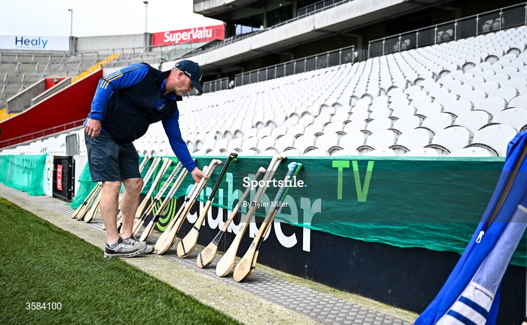4 October 2026; St Finbarrs logistics staff Damien Murray lays hurleys on the side of the pitch before the Cork County Senior Club Hurling Championship semi-final match between Kanturk and St Finbarrs at SuperValu Páirc Uí Chaoimh in Cork. Photo by Tyler Miller/Sportsfile