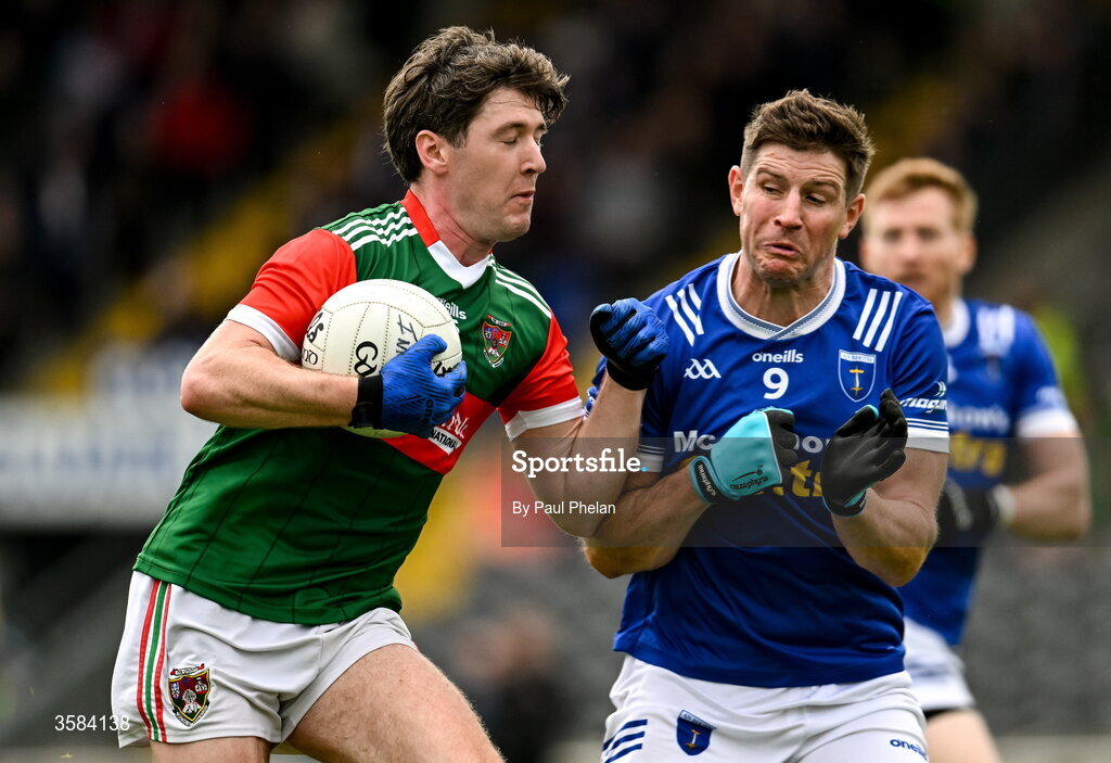 4 October 2026; Aidan Woods in action against Darren Hughes of Scotstown during the Monaghan County Senior Club Football Championship semi-final match between Scotstown and Inniskeen at St Tiernach’s Park in Clones, Monaghan. Photo by Paul Phelan/Sportsfile