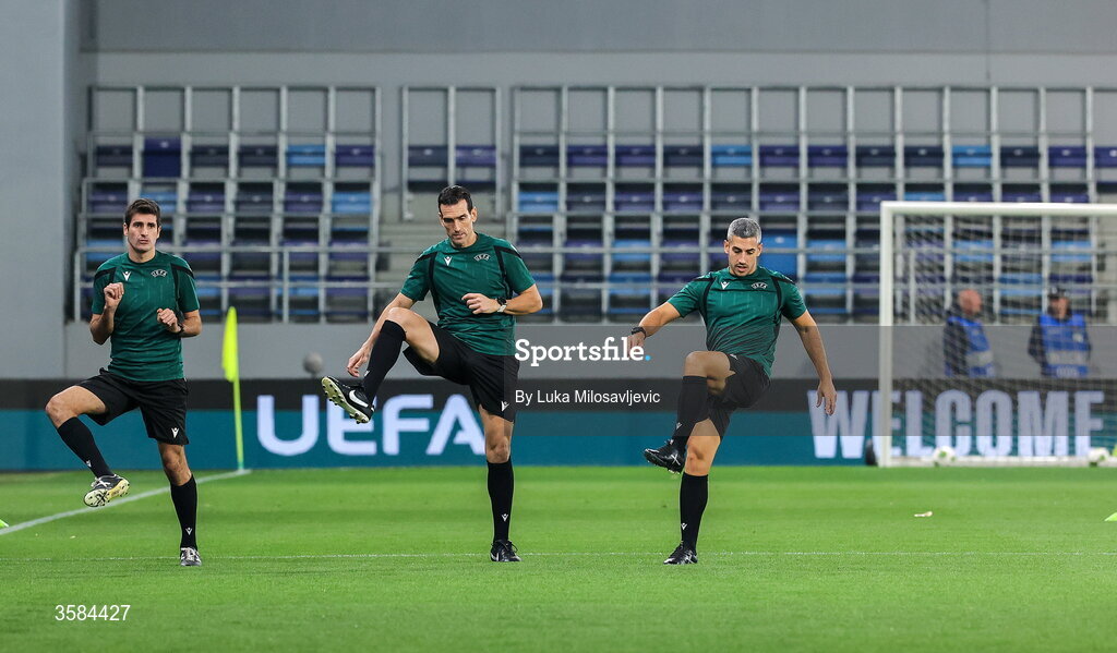 4 October 2026; Match officials, from left, assistant referee Carlos Álvarez Fernández, referee Juan Martínez Munuera and assistant referee Iván Masso Granado warm up before the UEFA Nations League B match between the Republic of Ireland and Israel at TSC Arena in Backa Topola, Serbia. Photo by Luka Milosavljevic/Sportsfile