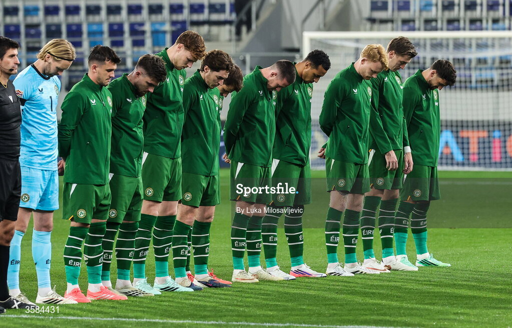4 October 2026; The Republic of Ireland team, wearing black armbands in recognition for all the lives lost in the conflict in Gaza, bow their heads during the Israeli national anthem before the UEFA Nations League B match between the Republic of Ireland and Israel at TSC Arena in Backa Topola, Serbia. Photo by Luka Milosavljevic/Sportsfile