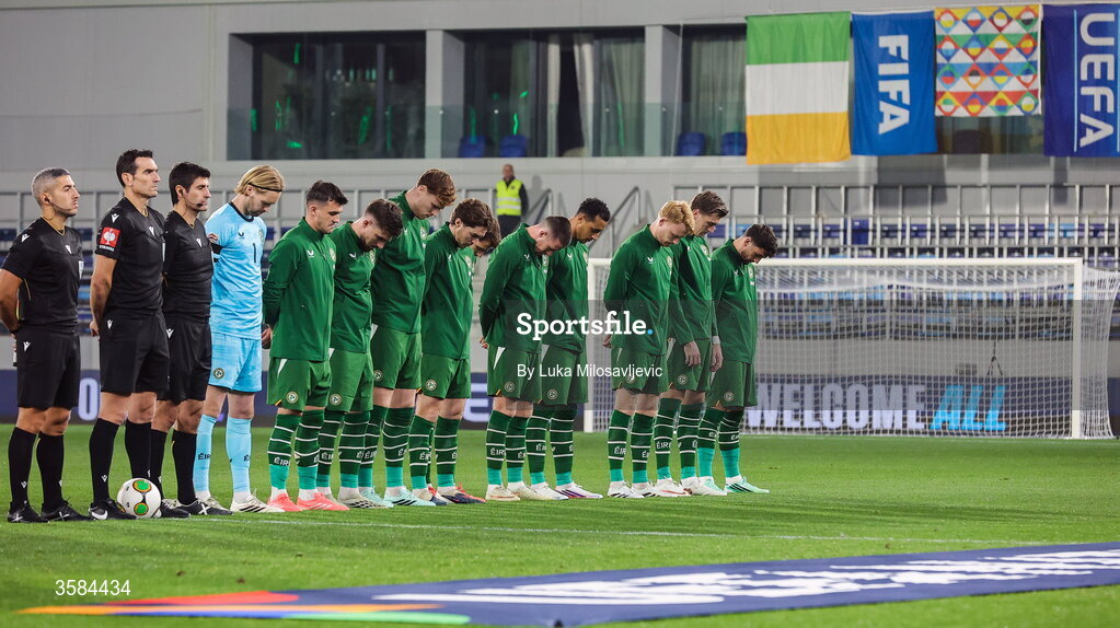 4 October 2026; The Republic of Ireland team, wearing black armbands in recognition for all the lives lost in the conflict in Gaza, bow their heads during the Israeli national anthem before the UEFA Nations League B match between the Republic of Ireland and Israel at TSC Arena in Backa Topola, Serbia. Photo by Luka Milosavljevic/Sportsfile