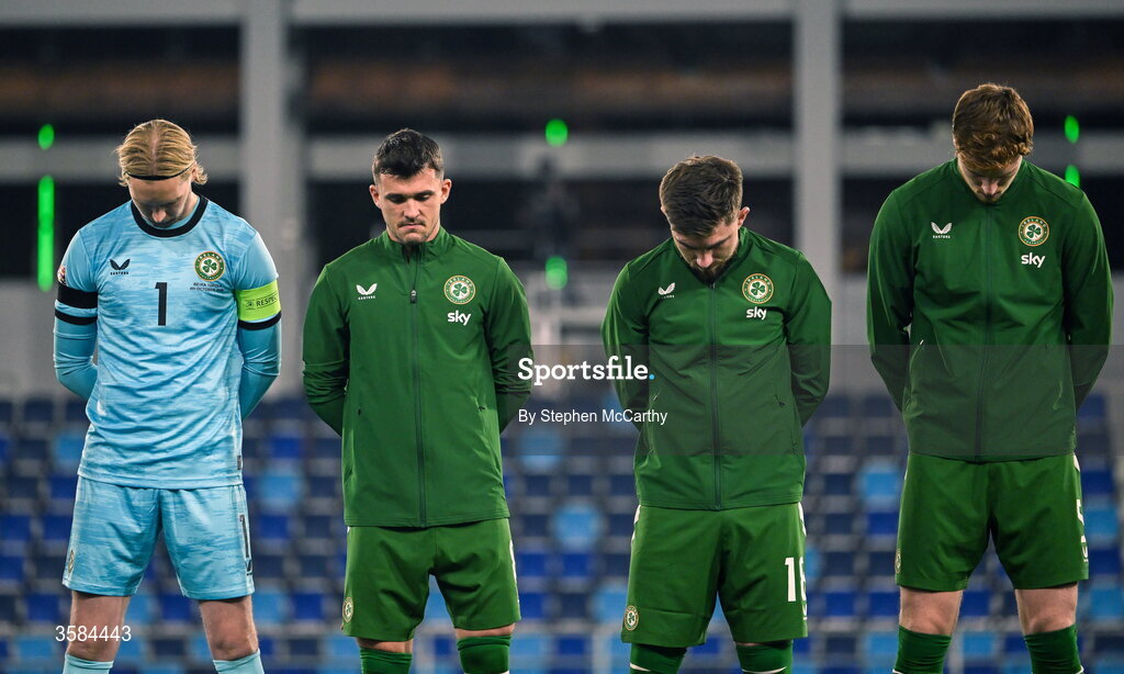 4 October 2026; Republic of Ireland players, from left, captain Caoimhín Kelleher, Ryan Manning, Jake O'Brien and Conor Coventry, wearing black armbands in recognition for all the lives lost in the conflict in Gaza, bow their heads during the Israeli national anthem before the UEFA Nations League B match between the Republic of Ireland and Israel at TSC Arena in Backa Topola, Serbia. Photo by Stephen McCarthy/Sportsfile