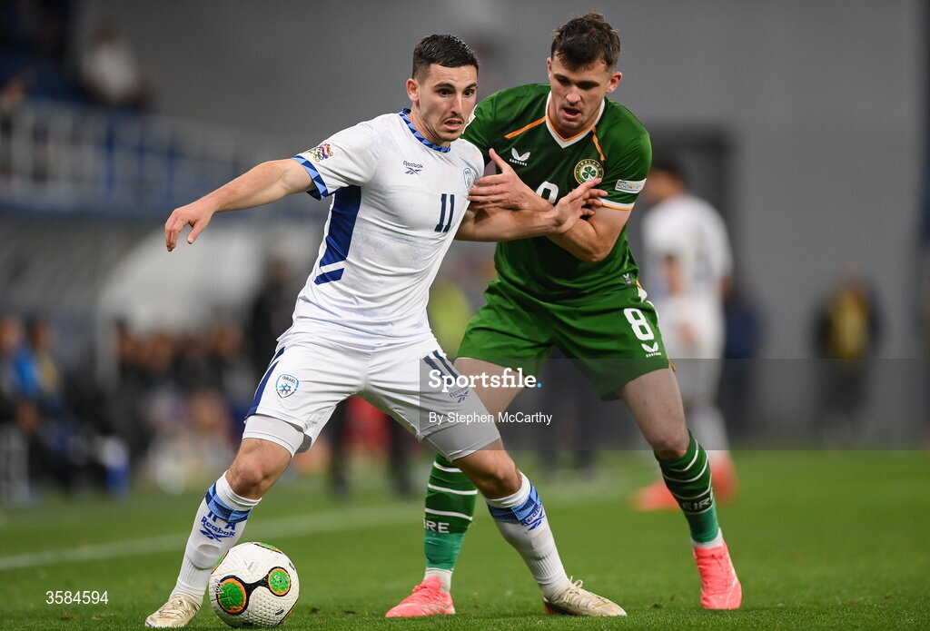 4 October 2026; Oscar Gloukh of Israel is tackled by Jason Knight of Republic of Ireland during the UEFA Nations League B match between the Republic of Ireland and Israel at TSC Arena in Backa Topola, Serbia. Photo by Stephen McCarthy/Sportsfile