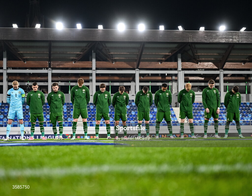 4 October 2026; The Republic of Ireland team, from left, goalkeeper Caoimhín Kelleher, Jason Knight, Ryan Manning, Jake O'Brien, Conor Coventry, Jayson Molumby, Jack Moylan, Adam Idah, Liam Scales, Jimmy Dunne and Troy Parrott wearing black armbands in recognition for all the lives lost in the conflict in Gaza, bow their heads during the Israeli national anthem before before the UEFA Nations League B match between the Republic of Ireland and Israel at TSC Arena in Backa Topola, Serbia. Photo by Stephen McCarthy/Sportsfile Photo by Stephen McCarthy/Sportsfile