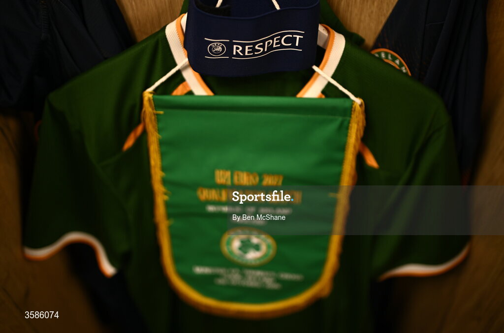 6 October 2026; The captains armband is seen with the jersey of Sean Grehan and a pennant in the Republic of Ireland dressing room before the UEFA European U21 Championship qualifier match between the Republic of Ireland and England at Turner's Cross Stadium in Cork. Photo by Ben McShane/Sportsfile