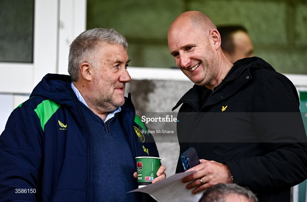 6 October 2026; FAI President Paul Cooke, left, in conversation with player agent and former player Gary Rogers before the UEFA European U21 Championship qualifier match between the Republic of Ireland and England at Turner's Cross Stadium in Cork. Photo by Ben McShane/Sportsfile