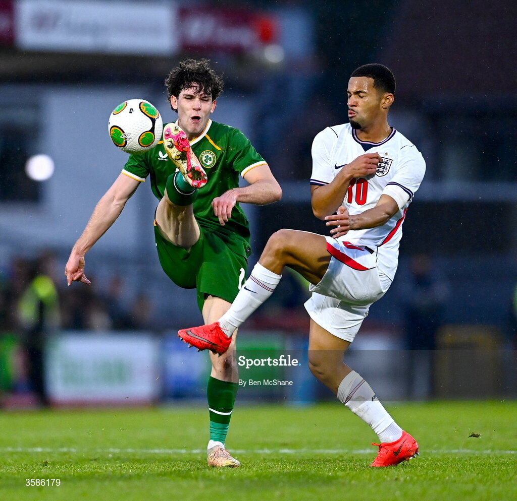 6 October 2026; Rory Finneran of Republic of Ireland in action against Ethan Nwaneri of England during the UEFA European U21 Championship qualifier match between the Republic of Ireland and England at Turner's Cross Stadium in Cork. Photo by Ben McShane/Sportsfile