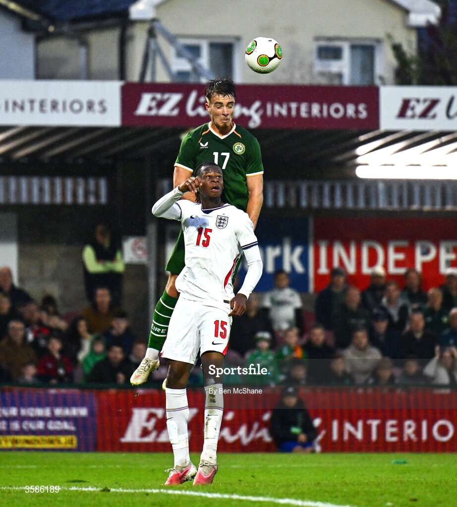 6 October 2026; Tommy Lonergan of Republic of Ireland in action against Stephen Mfuni of England during the UEFA European U21 Championship qualifier match between the Republic of Ireland and England at Turner's Cross Stadium in Cork. Photo by Ben McShane/Sportsfile