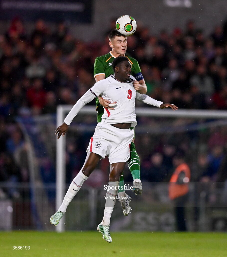 6 October 2026; Sean Grehan of Republic of Ireland in action against Divin Mubama of England during the UEFA European U21 Championship qualifier match between the Republic of Ireland and England at Turner's Cross Stadium in Cork. Photo by Ben McShane/Sportsfile