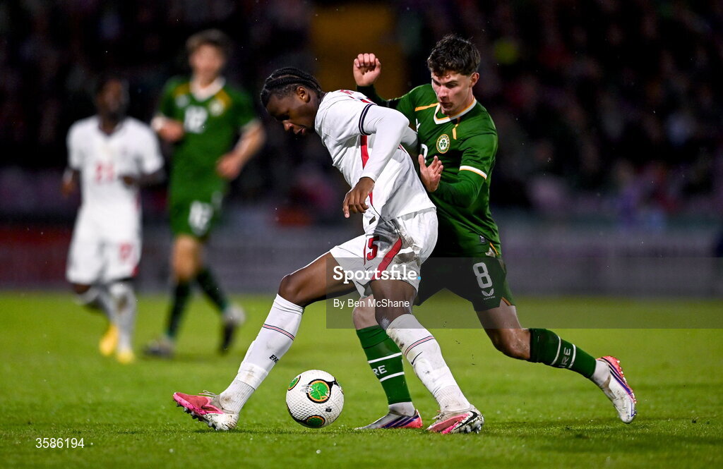 6 October 2026; Stephen Mfuni of England in action against Jamie Mullins of Republic of Ireland during the UEFA European U21 Championship qualifier match between the Republic of Ireland and England at Turner's Cross Stadium in Cork. Photo by Ben McShane/Sportsfile